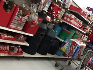 Hey, check out this candid mom shopping hidden in the store! 😎