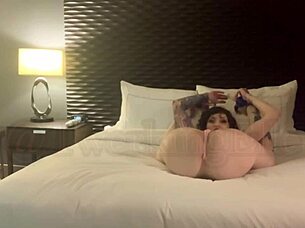 a girl digs into her own pussy with toys at home