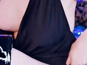 girl practicing deepthroat skills on webcam in costume