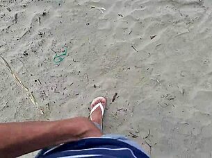 A beautiful redhead caught me masturbating on the street. She gave a risky handjob in the public forest.