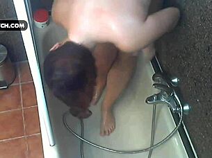 Chubby teen masturbates to orgasm in soapy bathtub