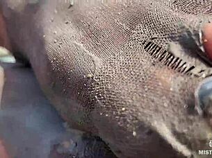 Goddess shows her messy nylon feet close up. Torn pantyhose on the river bank 😍