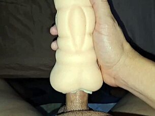 Fuck doll filled with cum running inside rubber