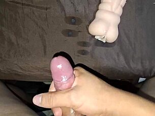 Fuck doll filled with cum running inside rubber