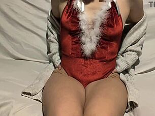 The teen Santa girl indulges in solo masturbation.