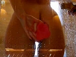 i'm bathing with a pink cock spreadin my wet ass