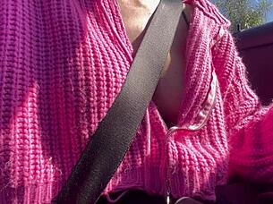 Artemisia Love flashes juicy big tits while driving outdoors