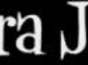 Sara Jay plays with her longest glass dildo in a red outfit