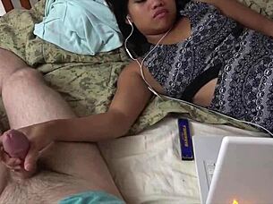 Feeling intense pleasure from handjob in bedroom with big cock