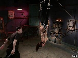 Damn, busty babe bent over gets ass caned in tight bondage!