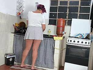 my wife's friend washing dishes in skirt