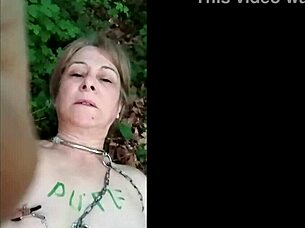 Is The Slave Ready For Outdoor Domination In The Forest? Her Natural Tits Bounce As She Takes The Dildo Deep.