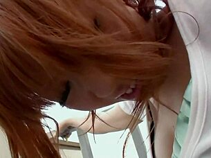 Redhead Japanese beauty gets intimate in sensual massage