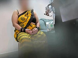 doctor examines indian patient in asian clinic setting