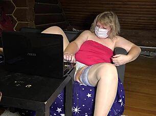 A mature housewife in a sex chat SHOWS OFF her chubby figure, legs in STOCKINGS, and big ASS under skirt