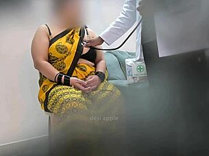 doctor examines indian patient in asian clinic setting