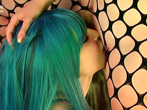 succubus in fishnets fucks with strapon and squirts