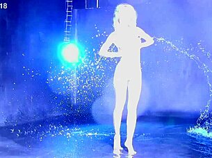 beautiful blonde teen playing naked in the water