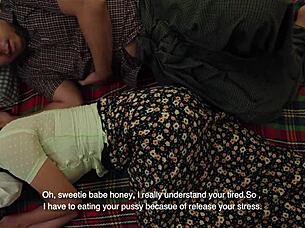 An amateur asian couple can't stop fucking while on a big fire, muff diving and intense.