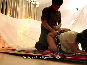 An amateur asian couple can't stop fucking while on a big fire, muff diving and intense.