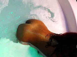 Jacuzzi relaxation with Ebony and Khalessi in a group setting.