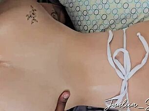 A man with a thick penis engages with a young woman.