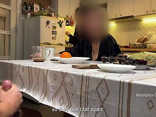 husband jerking under table in kitchen with step mom watching