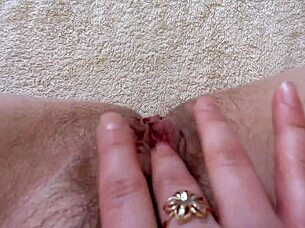 hairy pussy squirts as brunette jerks clit to orgasm in amateur fetish