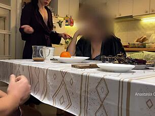 husband jerking under table in kitchen with step mom watching