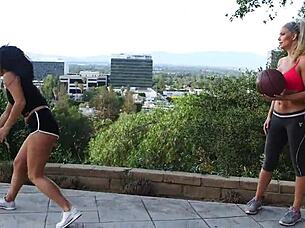 blonde beauty and brunette babe casually lick and finger each other with toys