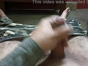 Mature man handles penis at high speed