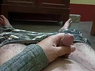 Mature man handles penis at high speed