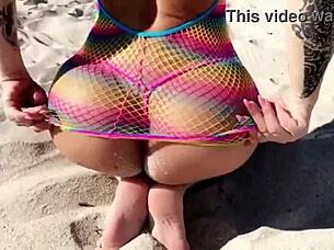 Beautiful blonde milf enjoys the beach with her big tits and ass.