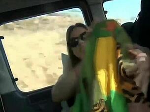 Young adult engages in solo play with toys in car