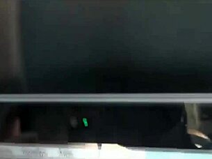 Young adult engages in solo play with toys in car