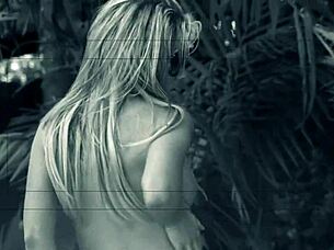 outdoors in the sun, aubrey adams enjoys the warmth and relaxation