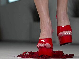 brunette crushes fruits with bare feet and heels in footfetish video