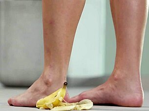 brunette crushes fruits with bare feet and heels in footfetish video