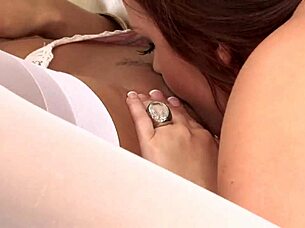 Lesbians rub cunts then fuck in 69!