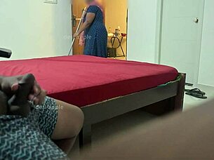 Maid intensely jerks off owner while flashing ass