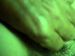 Boldly spreading wet hairy pussy close up.