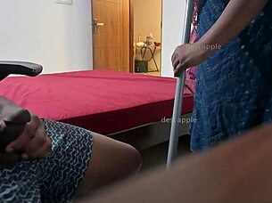 Maid intensely jerks off owner while flashing ass