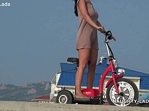 Milf wife rides naked in public flashing