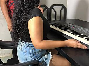 What a curvy young woman in a tight skirt during hot keyboard lessons!