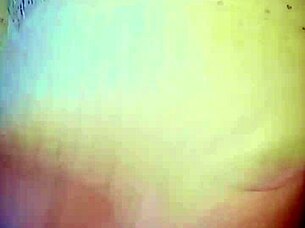 Milf shows off her wet hairy pussy in bedroom