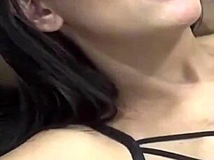 Look at this beautiful young latina couple. The cute girl is giving kisses to her athletic friend