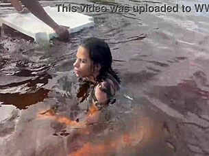 Watch me fuck the hot brunette pornstar right in the middle of the lake!