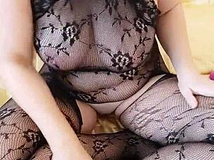 juicy mom with big boobs subtly masturbating with a dildo at home.