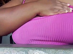 Latina slut flashes big tits from window to guys on street 😏