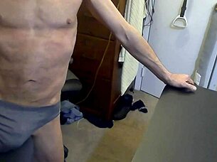 Skinny bodybuilder grinds on stool in briefs